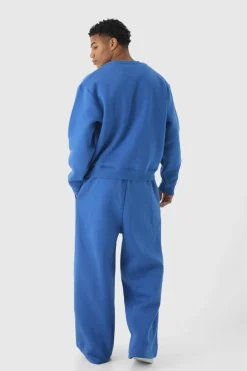Fashion boohooMAN Extreme Wide Leg Man Spray Wash Joggers cobalt