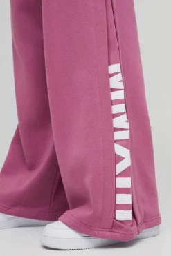 Store boohooMAN Extreme Wide Leg Pleated Gusset Jogger mauve
