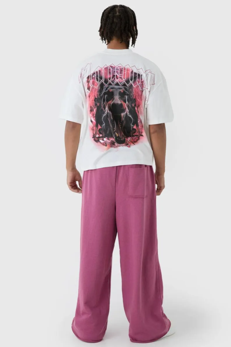 Shop boohooMAN Extreme Wide Leg Raw Edge Loopback Jogger mauve
