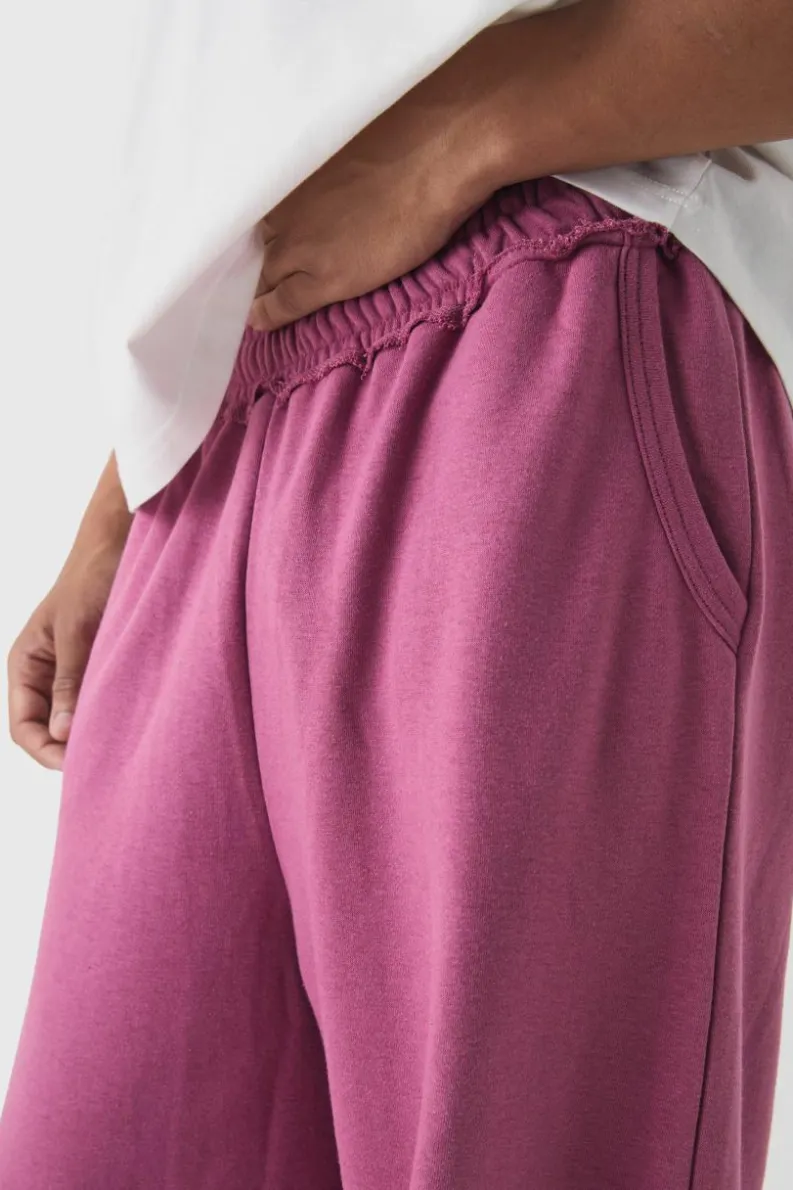 Shop boohooMAN Extreme Wide Leg Raw Edge Loopback Jogger mauve