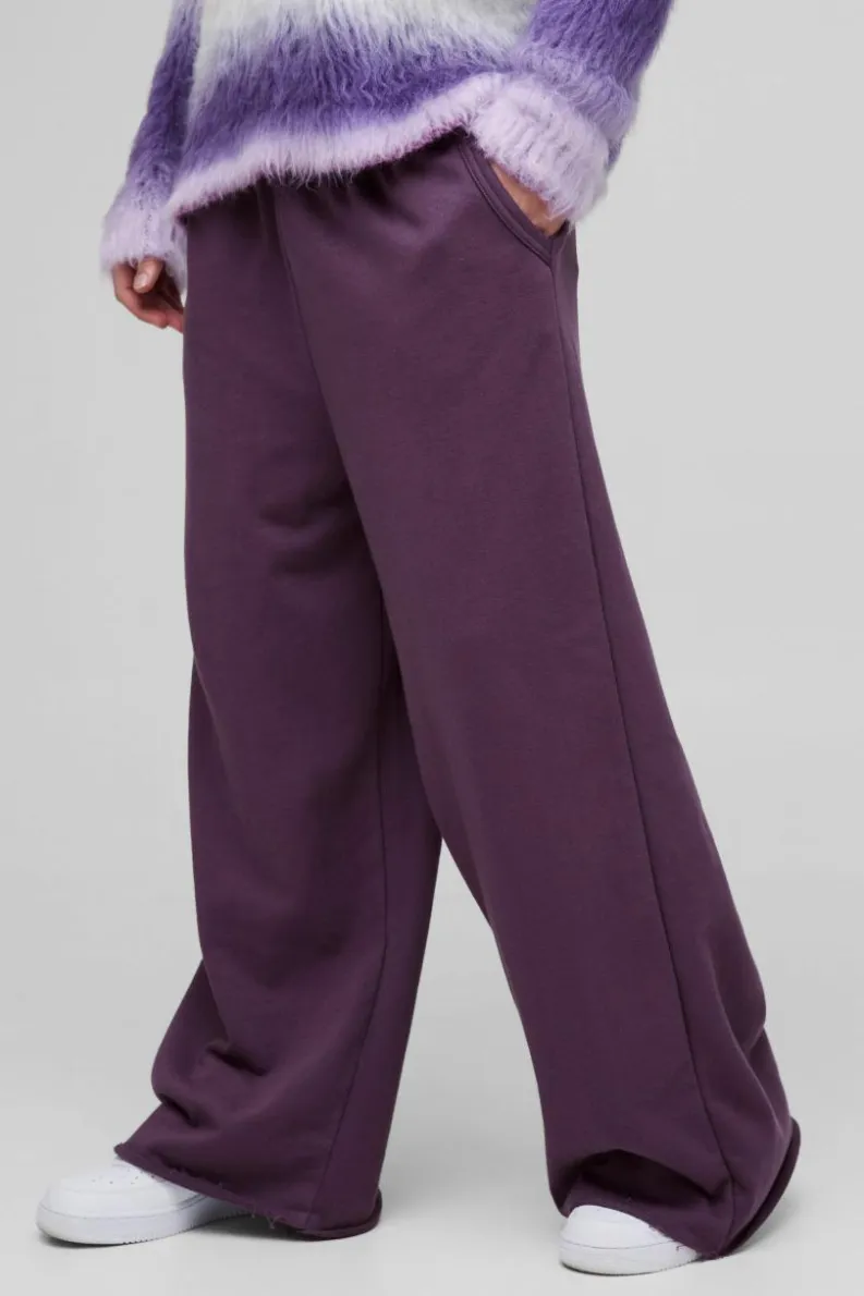 Store boohooMAN Extreme Wide Leg Raw Edge Loopback Jogger purple