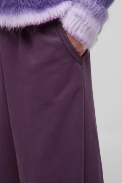 Store boohooMAN Extreme Wide Leg Raw Edge Loopback Jogger purple