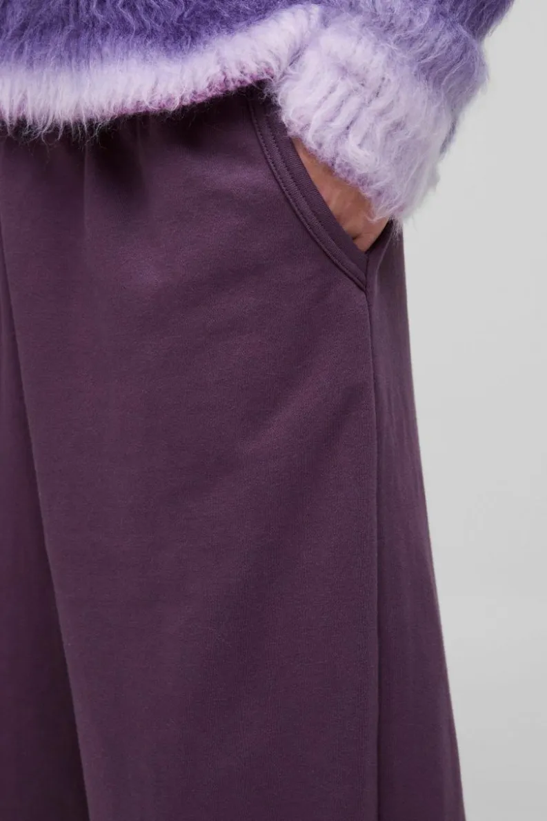 Store boohooMAN Extreme Wide Leg Raw Edge Loopback Jogger purple