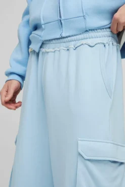 Discount boohooMAN Extreme Wide Leg Raw Edge Loopback Cargo Jogger light blue