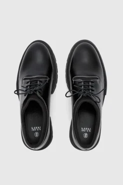 Store boohooMAN Faux Leather Contrast Stitch Brogue In black