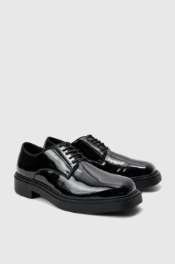 Shop boohooMAN Faux Leather Derby Shoes In black