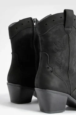 Shop boohoo Faux Suede Cut Out Detail Western Cowboy Boots black