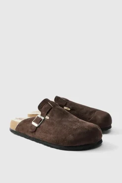Shop boohooMAN Faux Suede Sherpa Lined Mule In brown