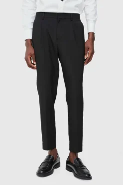 Shop boohooMAN Fixed Waist Pleat Front Tapered Tailored Trousers black