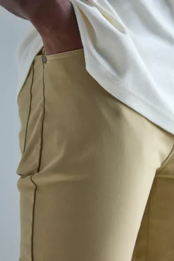 Shop boohooMAN Fixed Waist Slim Fit Technical Stretch Trouser stone