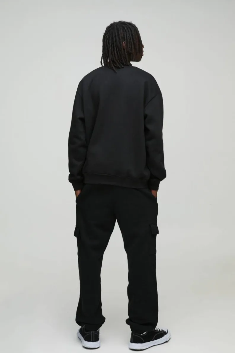 Shop boohooMAN 330GSM Oversized Fit Basic Cargo Jogger black