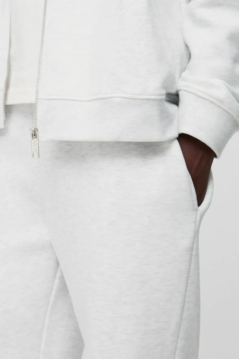 Shop boohooMAN 330GSM Regular Fit Split Hem Jogger grey marl