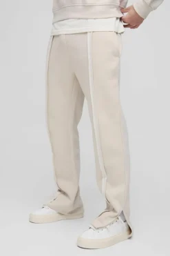 Shop boohooMAN 330GSM Regular Fit Split Hem Raw Edge Jogger stone