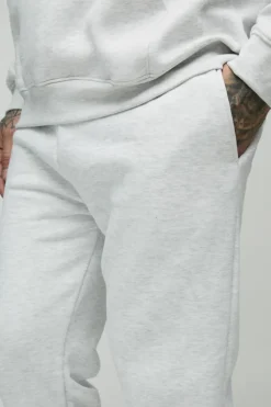 Store boohooMAN 330GSM Tall Slim Leg Fit Jogger In grey marl