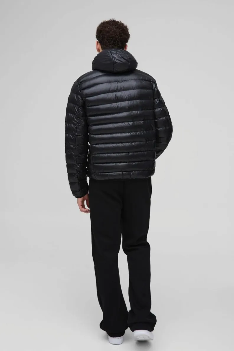 Best boohooMAN High Shine Quilted Hooded Jacket In black