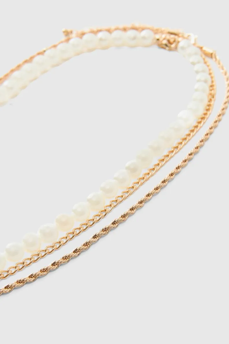 Discount boohooMAN Layered Pearl Necklace With Cross Pendant in gold