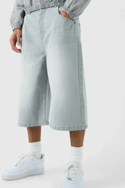 Shop boohooMAN Long Line Denim Jorts In Grey Wash light grey