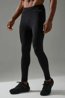 Shop boohooMAN Man Active Base Layer Legging black