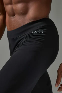 Shop boohooMAN Man Active Base Layer Legging black