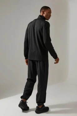 Store boohooMAN Man Active Breathable Marl 1/4 Zip Top black
