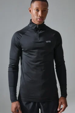 Shop boohooMAN Man Active Golf Raglan Muscle Fit 1/4 Zip black