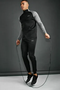 Shop boohooMAN Man Active Gym Funnel Neck Tracksuit black