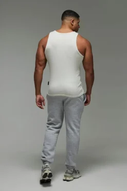 Shop boohooMAN Man Active Gym Muscle Fit Ribbed Vest grey