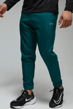 Best Sale boohooMAN Man Active Gym Tapered Jogger teal