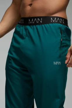 Best Sale boohooMAN Man Active Gym Tapered Jogger teal