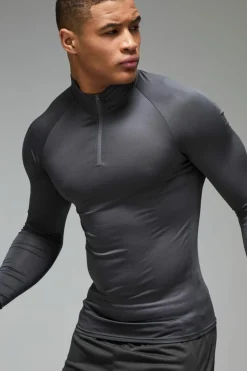 Shop boohooMAN Man Active Lightweight Essentials Gym Raglan Muscle Fit 1/4 Zip charcoal
