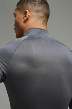 Shop boohooMAN Man Active Lightweight Essentials Gym Raglan Muscle Fit 1/4 Zip charcoal