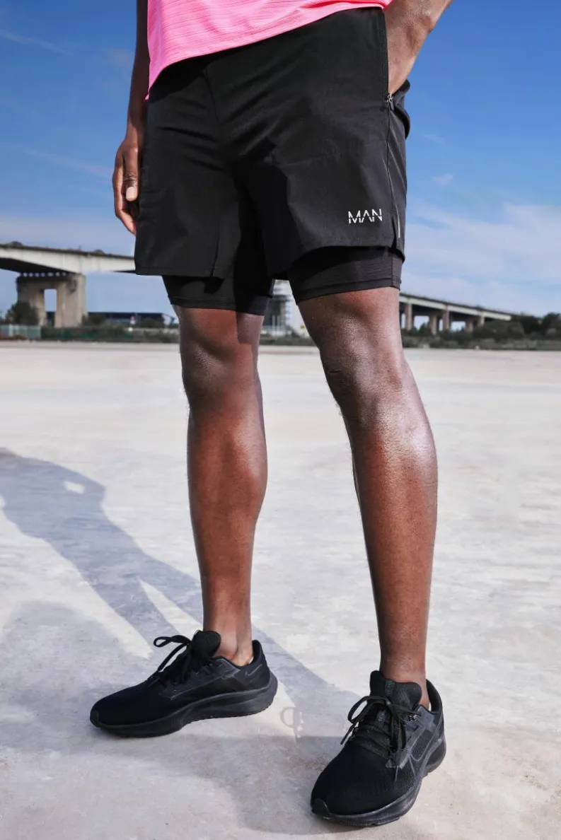 Shop boohooMAN Man Active Lightweight Performance 2-in-1 Shorts black