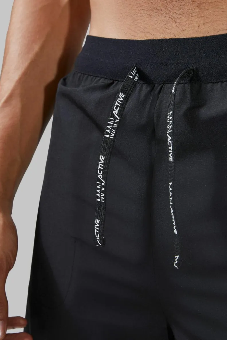 Shop boohooMAN Man Active Lightweight Performance 2-in-1 Shorts black