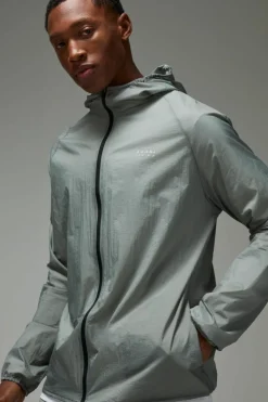Shop boohooMAN Man Active Lightweight Shower Resistant Windbreaker charcoal
