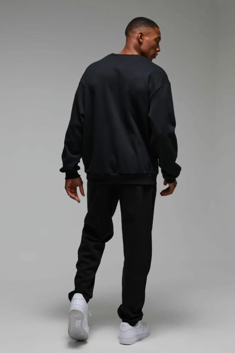 Online boohooMAN Man Active Los Angeles Lift Club Oversized Jogger black