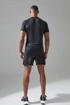 Shop boohooMAN Man Active Muscle Fit Breathable Lightweight T-shirt black