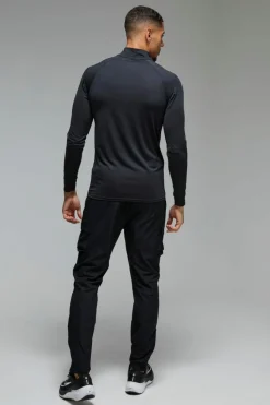 Online boohooMAN Man Active Muscle Fit Raglan 1/4 Zip black