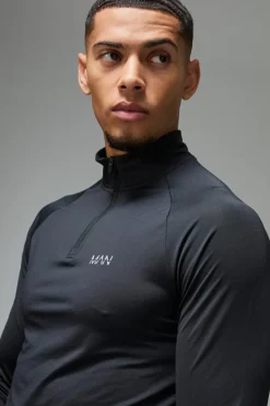 Online boohooMAN Man Active Muscle Fit Raglan 1/4 Zip black