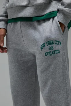 Online boohooMAN Man Active New York City Athletics Oversized Jogger grey marl
