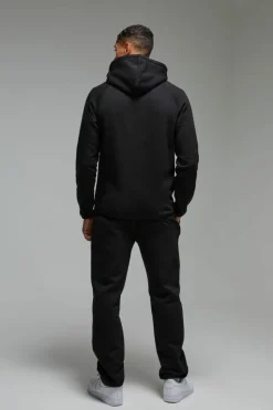 Shop boohooMAN Man Active Regular Fit Badge Hoodie black