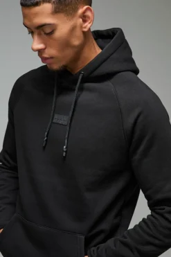 Shop boohooMAN Man Active Regular Fit Badge Hoodie black