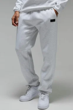 Outlet boohooMAN Man Active Regular Fit Badge Jogger grey marl