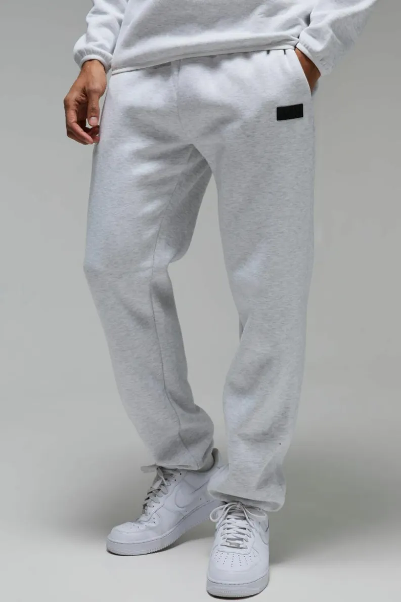 Outlet boohooMAN Man Active Regular Fit Badge Jogger grey marl