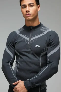 Shop boohooMAN Man Active Seamless Muscle Fit 1/4 Zip Top black