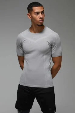 Shop boohooMAN Man Active Seamless Muscle Fit T-shirt grey