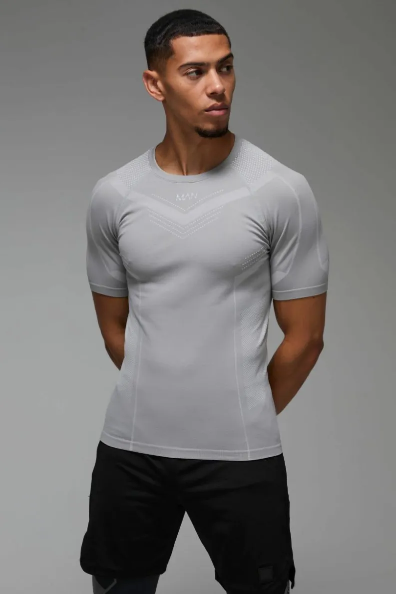 Shop boohooMAN Man Active Seamless Muscle Fit T-shirt grey