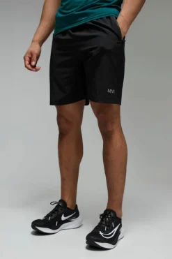 Shop boohooMAN Man Active Stretch Woven 7inch Short black
