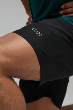 Shop boohooMAN Man Active Stretch Woven 7inch Short black