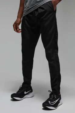 Discount boohooMAN Man Active Stretch Woven Reflective Tapered Jogger black