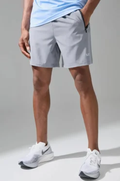 Best Sale boohooMAN Man Active Stretch Woven Regular Fit 7inch Gym Short light grey